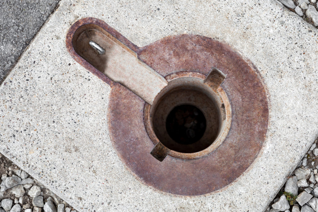 View from above of an embedded mount for a removable bollard.