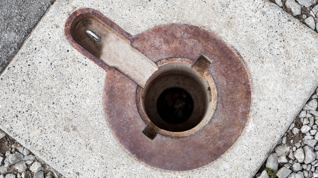 An embedded mount into which removable bollards are locked into place.